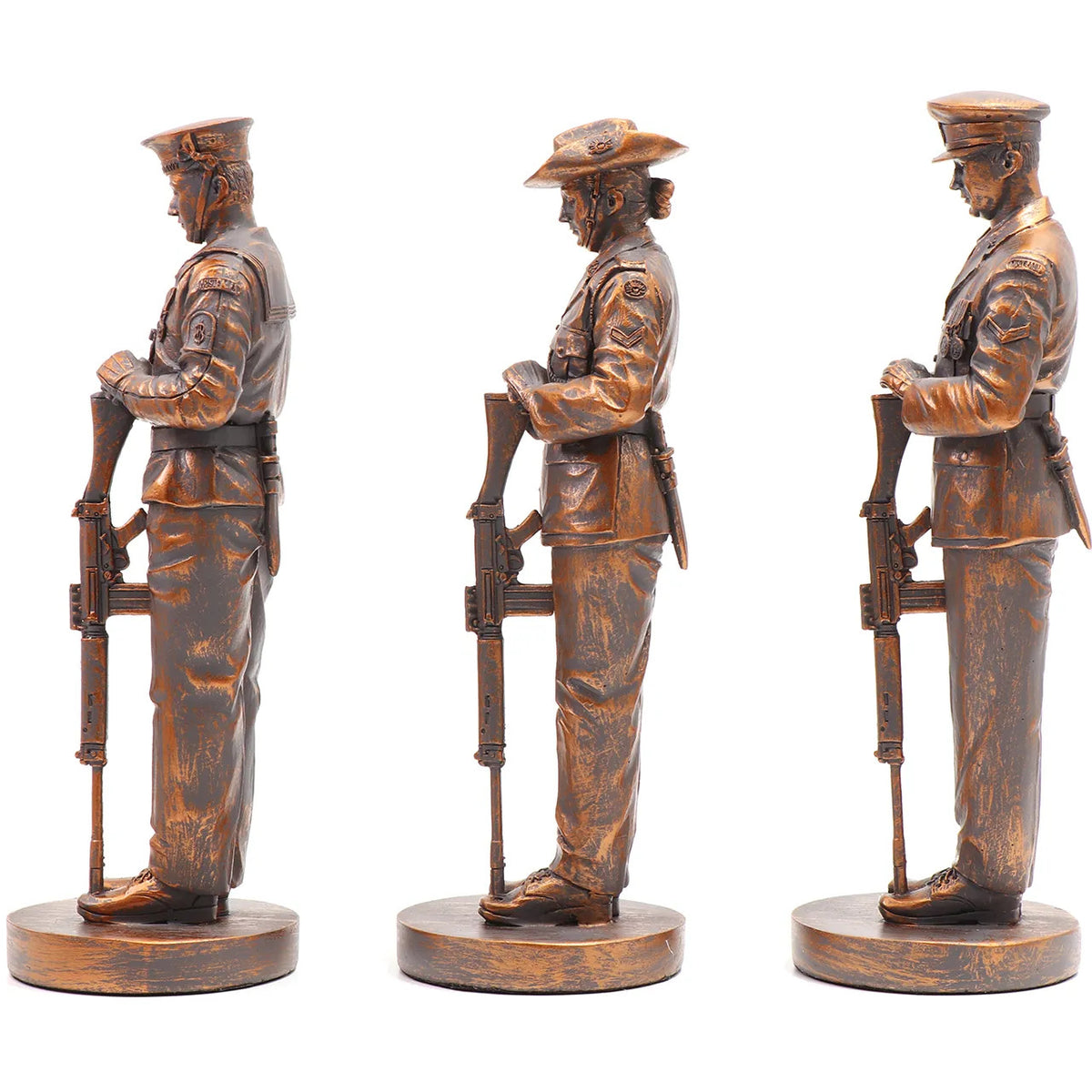 This stunning Courage, Honour, Sacrifice: We Will Remember Them* figurine is a remarkable tribute, crafted with exquisite attention to detail. The figurines, made from cold cast bronze, beautifully depict personnel from the Royal Australian Navy, Australian Army, and Royal Australian Air Force, all captured in a solemn Resting on Reversed Arms stance. www.moralepatches.com.au