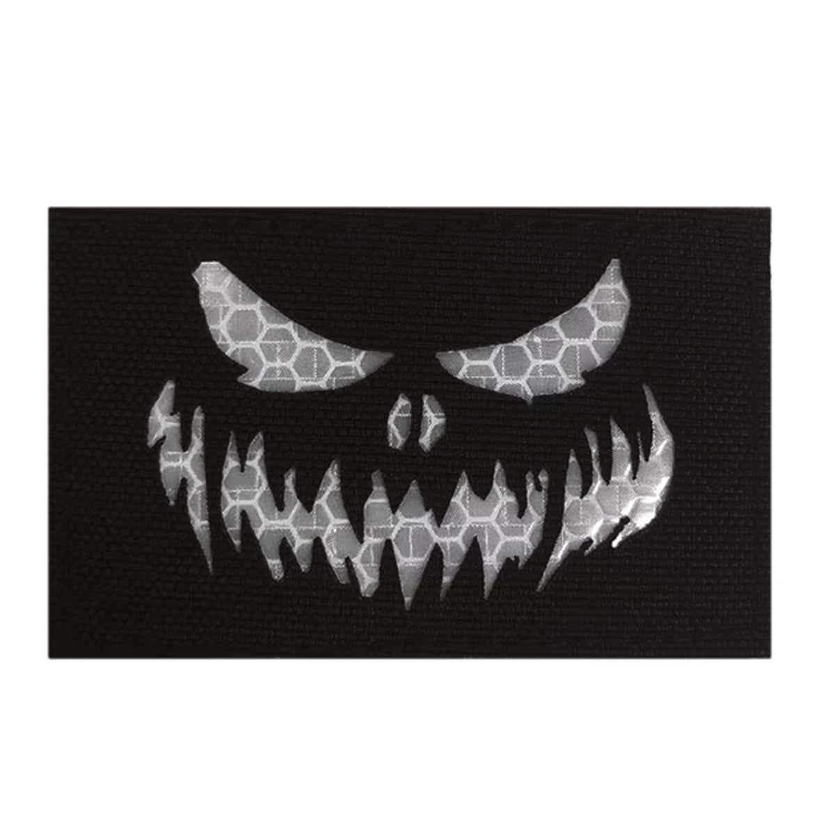 Stand out in low-light conditions with this striking Haunting Laser Cut Reflective Patch Hook & Loop. Precision laser-cut design delivers crisp, detailed edges that catch the eye, while the reflective feature ensures visibility when it matters most. www.moralepatches.com.au