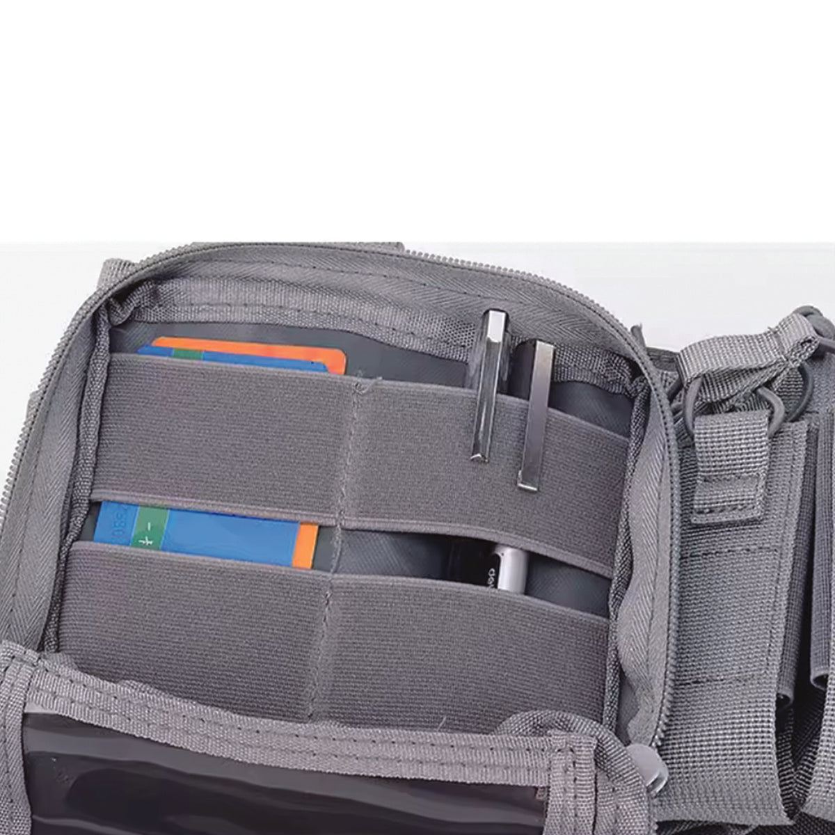 The Stealth OPS Gear Chest Rig Harness in Gray is crafted from durable 500D Nylon, offering strength without the bulk. Its lightweight and compact design ensures maximum mobility and speed with minimal drag. Equipped with four large magazine pouches, two smaller ones, and two front pouches, it’s perfect for airsoft, military drills, and cadet training. Stay agile and prepared with this reliable chest rig. www.moralepatches.com.au