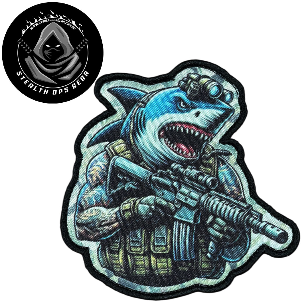 Unleash your creativity with the Shark Assault Embroidery Patch Hook & Loop Stealth Ops Gear! Measuring 9x8.8cm and featuring a beautifully embroidered design and secure hook & loop backing, this patch is a must-have for any collector. www.moralepatches.com.au