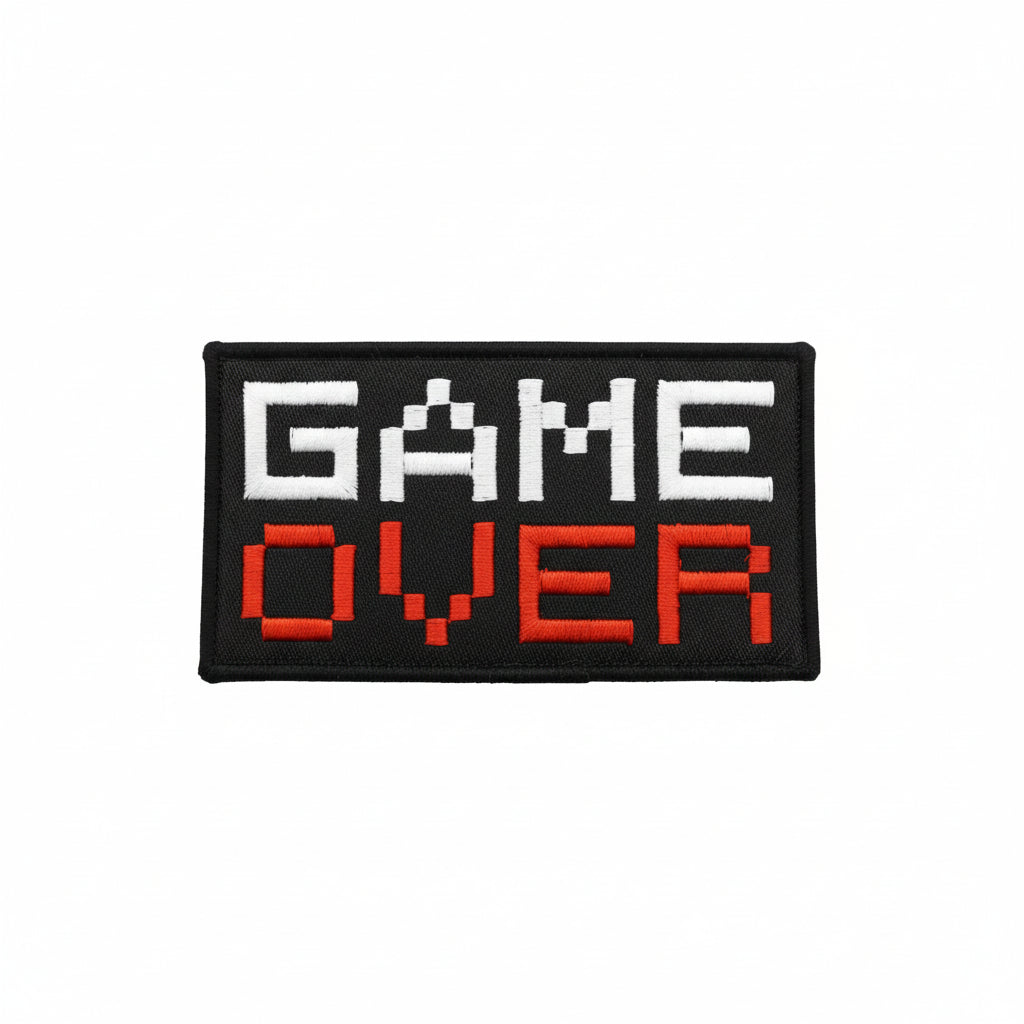 Dominate your gear with this striking Game Over Large Embroidery Morale Patch Hook & Loop , engineered for serious operators. Measuring 10.1x5.1cm, it features dual-sided hook and loop backing—both included—so you can attach it securely to tactical vests, bags, or uniforms and reposition as needed. Built tough for the field, this patch delivers attitude and functionality in one compact package. www.moralepatches.com.au
