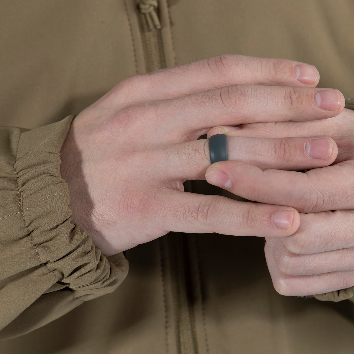 Silicone Ring is ideal for military and law enforcement professionals looking to prevent finger injuries caused by wearing a ring. Sturdy Yet Soft Tactical Wedding Ring Is A Safe Alternative To A Traditional Metal Ring For Police And Military Service Members Silicone Wedding Ring Constructed From Medical Grade Silicone For Maximum Durability Wedding Band Features A Non-Conductive Material Sleek Silicone Band Helps To Maintain A Professional Appearance For half sizes please go up