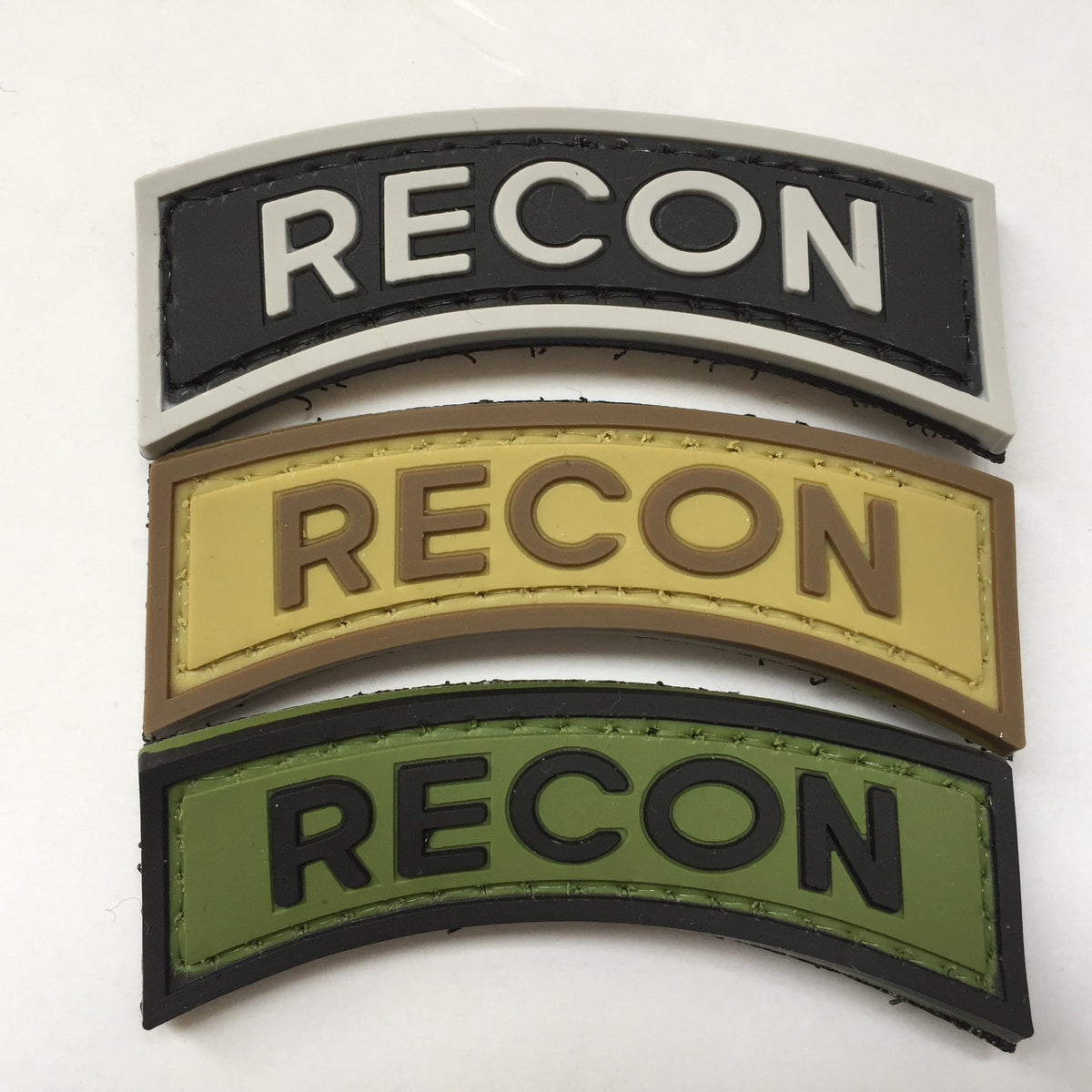 RECON PVC Patch, Velcro backed Badge. Great for attaching to your field gear, jackets, shirts, pants, jeans, hats or even create your own patch board. Size: 6.2x2cm