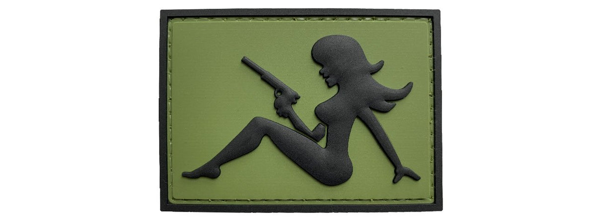 Mudflap Girl with Pistol on Right Hand PVC Patch, Velcro backed Badge. Great for attaching to your field gear, jackets, shirts, pants, jeans, hats or even create your own patch board. Size: 7x5cm