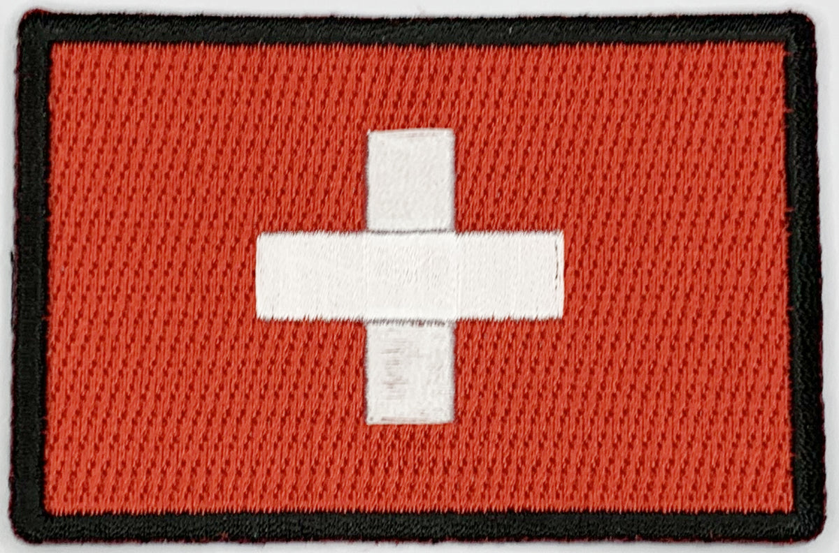 Swiss Flag Iron On Patch. Great for attaching to your jackets, shirts, pants, jeans, hats. Size: 7.62x5.08cm