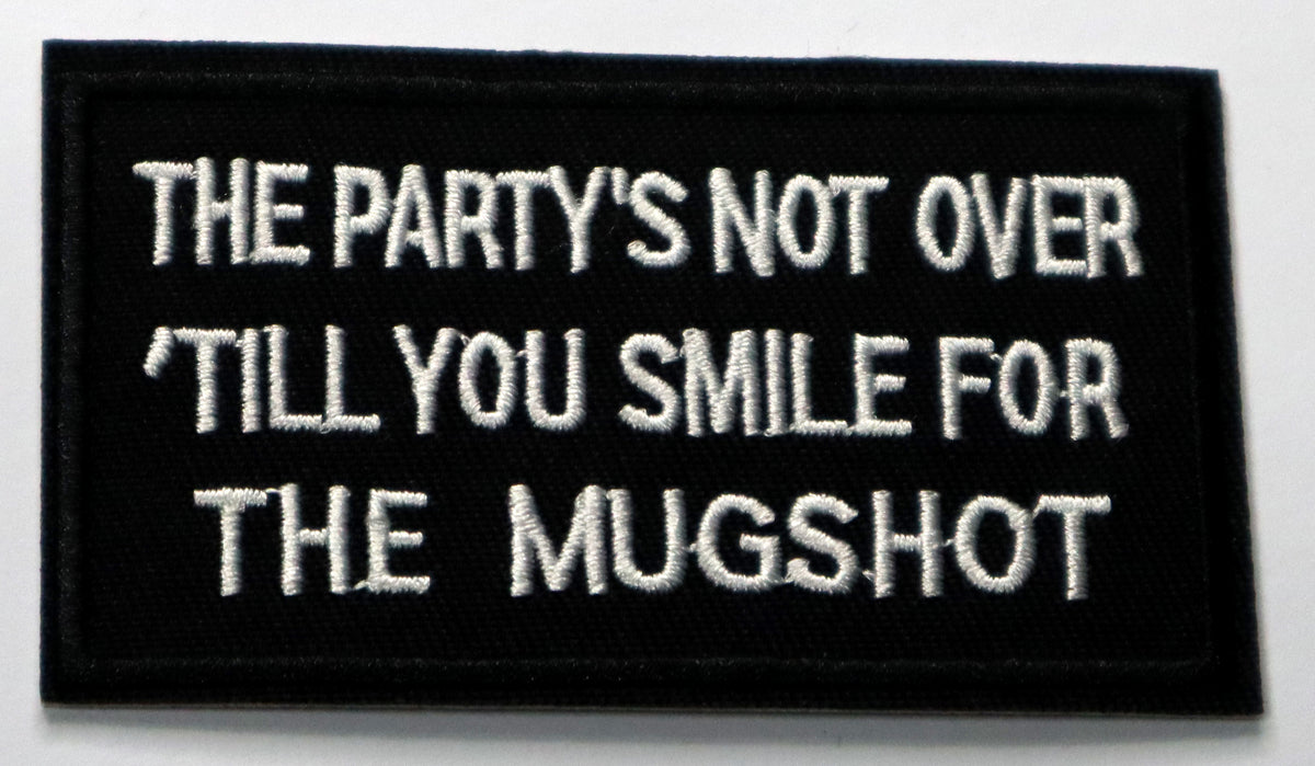 The party's not over until you smile for the mugshot Iron On Patch. Great for attaching to your jackets, shirts, pants, jeans, hats. Size: 9.2x5.3cm