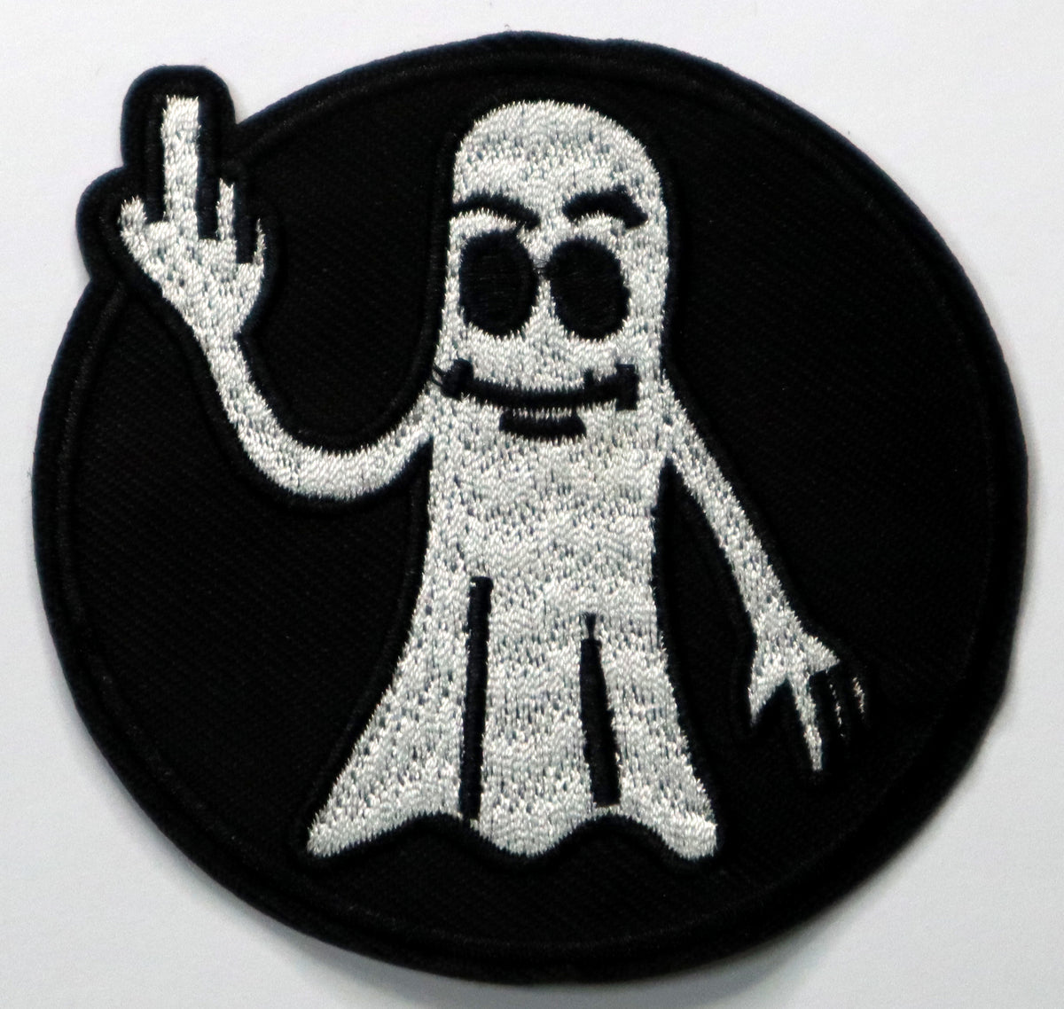 Ghost giving the finger Iron On Patch. Great for attaching to your jackets, shirts, pants, jeans, hats. Size: 7.8cm