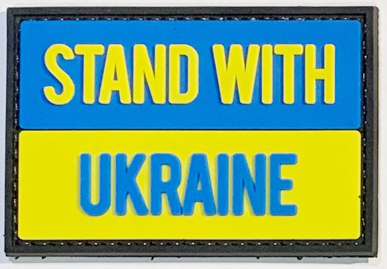 Stand with Ukraine PVC Patch, Velcro backed Badge. Great for attaching to your field gear, jackets, shirts, pants, jeans, hats or even create your own patch board. Size: 7.5x5cm
