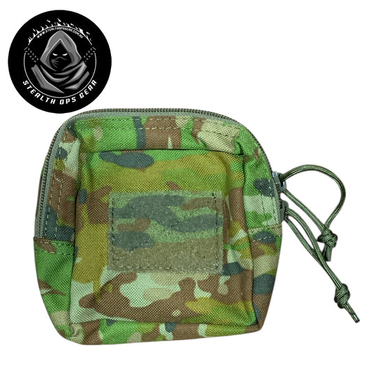 The AMCU Small Kit Pouch Stealth Ops Gear is an essential accessory for anyone needing quick access to small items without sacrificing space or comfort. Its compact dimensions of 12x11.5x6cm make it easy to attach to your belt, vest, or backpack without adding unnecessary bulk. www.moralepatches.com.au