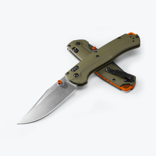 Make the leap from hunt carry to everyday carry.. By popular request, Benchmade's 15536 Taggedout®️ subtly reconfigures this hunt optimised folder into a multi-role outdoor EDC. Replacing the thumb hole with an orange anodised thumbstud and bearing an orange anodised lanyard backspacer, this new Taggedout®️ also trades in the featherweight Grivory®️ handle for OD Green G10. www.moralepatches.com.au