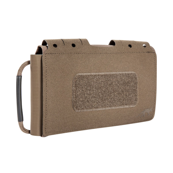 Small, flat IFAK pouch for mounting on MOLLE surfaces or on the belt. The fold-out first aid panel, which can be individually equipped, can be pulled out on both sides. www.moralepatches.com.au