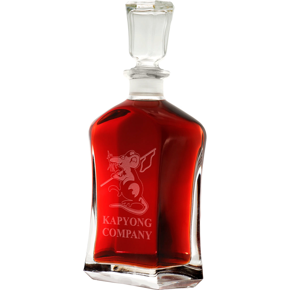 Bring your dining experience to life with the Kapyong&nbsp;Company Italian Glass Decanter. This elegant, 750ml decanter proudly displays the company crest, etched with precision onto the sleek glass surface. Perfect for gifting or displaying in your own cabinet or bar, this decanter is a must-have for any wine or spirit enthusiast. Enhance your evening with the beauty and quality of this stunning piece. www.moralepatches.com.au