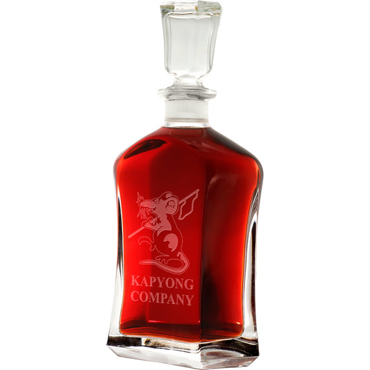Bring your dining experience to life with the Kapyong&nbsp;Company Italian Glass Decanter. This elegant, 750ml decanter proudly displays the company crest, etched with precision onto the sleek glass surface. Perfect for gifting or displaying in your own cabinet or bar, this decanter is a must-have for any wine or spirit enthusiast. Enhance your evening with the beauty and quality of this stunning piece. www.moralepatches.com.au