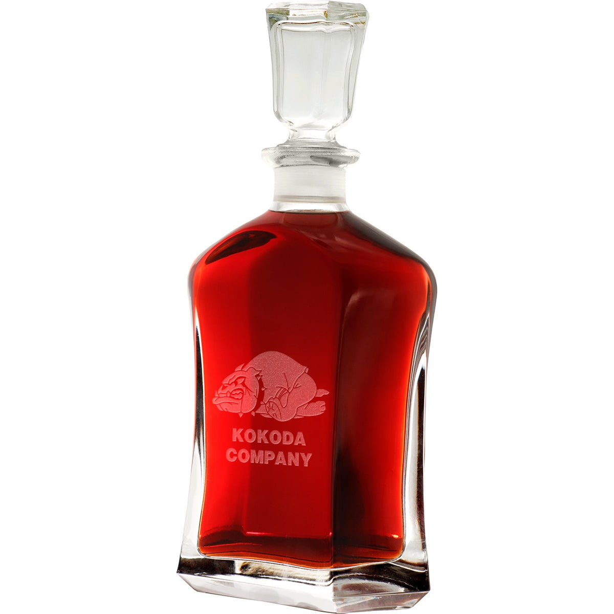Bring your dining experience to life with the Kokoda Company Italian Glass Decanter. This elegant, 750ml decanter proudly displays the company crest, etched with precision onto the sleek glass surface. Perfect for gifting or displaying in your own cabinet or bar, this decanter is a must-have for any wine or spirit enthusiast. Enhance your evening with the beauty and quality of this stunning piece. www.moralepatches.com.au