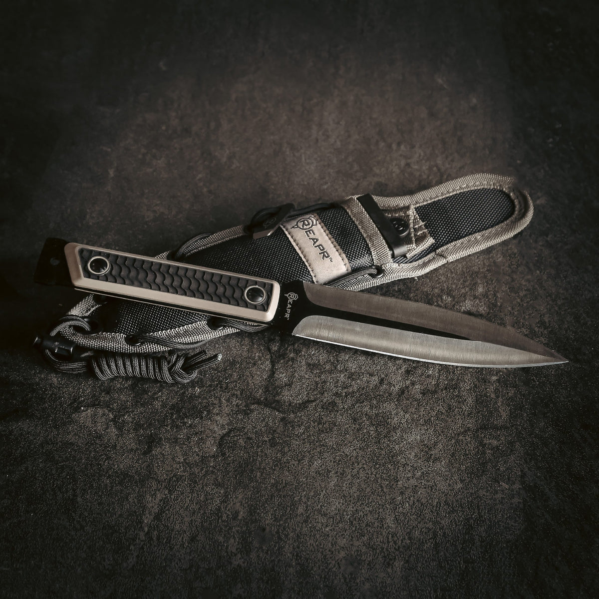 Build your own survival spear with this dual purpose Versa Spear Dagger from Reapr. Simply remove the dagger handle with the included take-down wrench and use the included paracord to affix the spearhead to a shaft of your choice. www.moralepatches.com.au