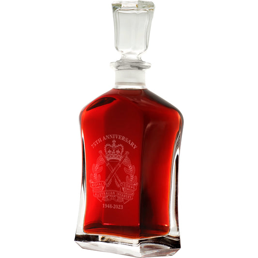 Bring your dining experience to life with the Rainf 75th Italian Glass Decanter. This elegant, 750ml decanter proudly displays the company crest, etched with precision onto the sleek glass surface. Perfect for gifting or displaying in your own cabinet or bar, this decanter is a must-have for any wine or spirit enthusiast. Enhance your evening with the beauty and quality of this stunning piece. www.moralepatches.com.au