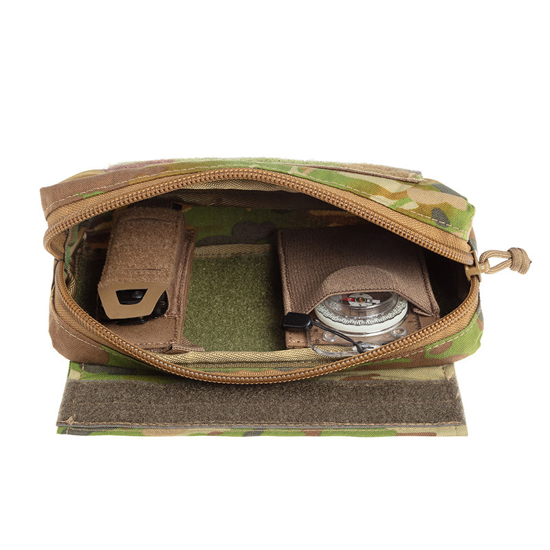 This versatile Tactical Vest Hanging Pouch AMCU serves multiple purposes - from carrying medical supplies, navigation essentials, to stowing general gear. Despite its compact size, it offers ample storage space. It can easily be attached to your vest or chest carrier thanks to its universal sandwich Hook &amp; Loop attachment. www.moralepatches.com.au