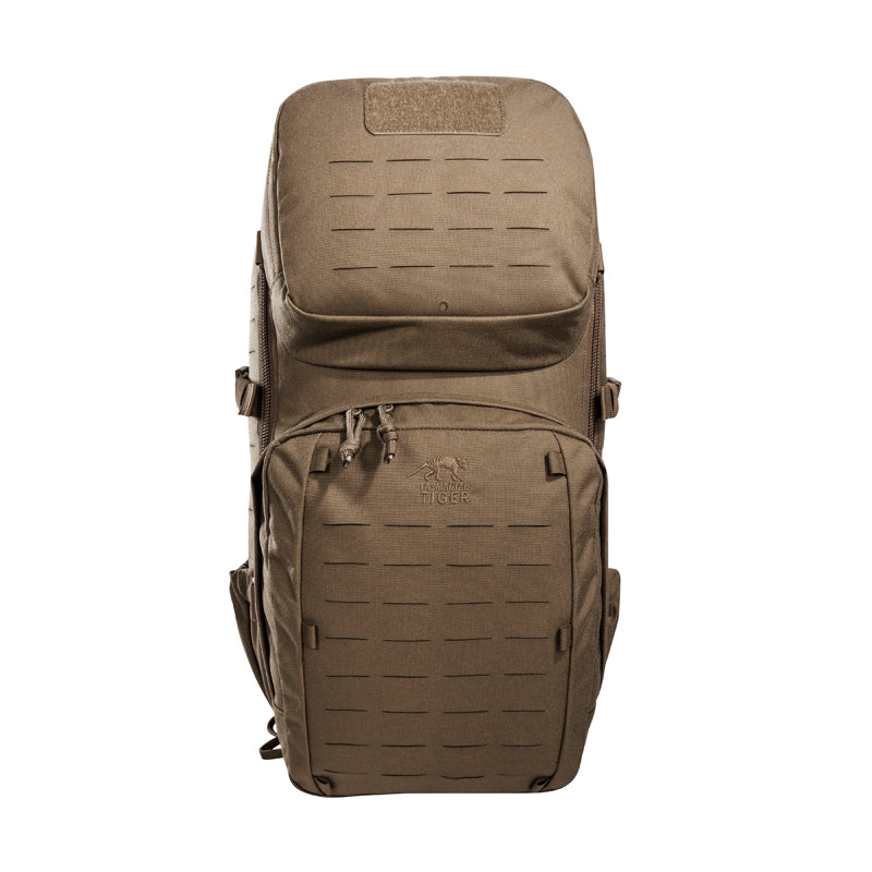 Small 22 litre universal combat backpack with two attachable pockets and elastic side pockets. It has a MOLLE hook-and-loop in the main compartment for customised modular add-ons and the laser-cut MOLLE on the front and sides mean you can combine it with other gear. www.moralepatches.com.au