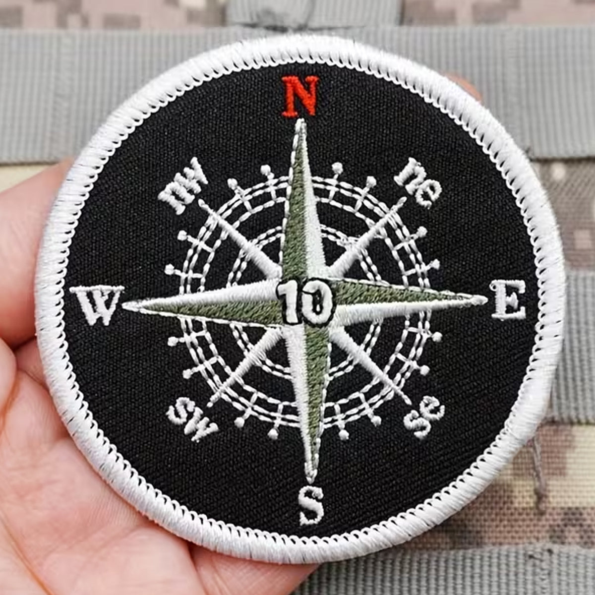 Unleash your creativity with the Compass Black &amp; White Embroidery Patch Hook &amp; Loop! Measuring 7.2cm and featuring a beautifully embroidered design and secure hook &amp; loop backing, this patch is a must-have for any collector. www.moralepatches.com.au