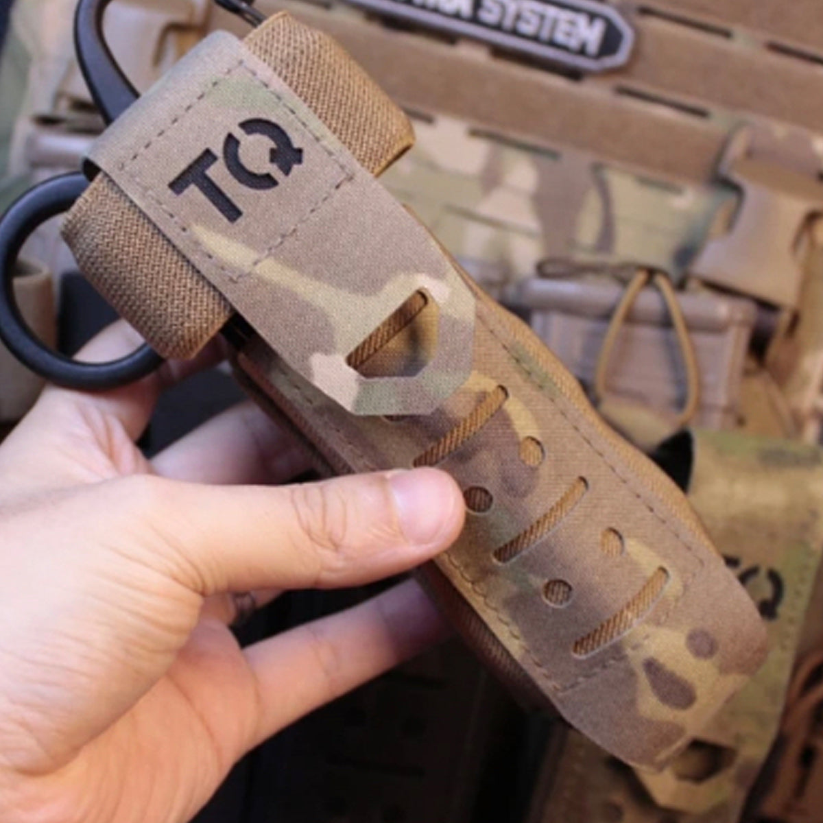 Ensure your medical supplies are always within reach with this tactical laser cut tourniquet holder. It's specially designed to fit your MOLLE system and holds your essential items close for rapid access during an emergency. Just one loop is all it takes to secure it safely and for maximum convenience. Be ready for all life throws at you with this ultra-convenient pouch! With quick access to your medical supplies, you can tackle any challenge! www.moralepatches.com.au