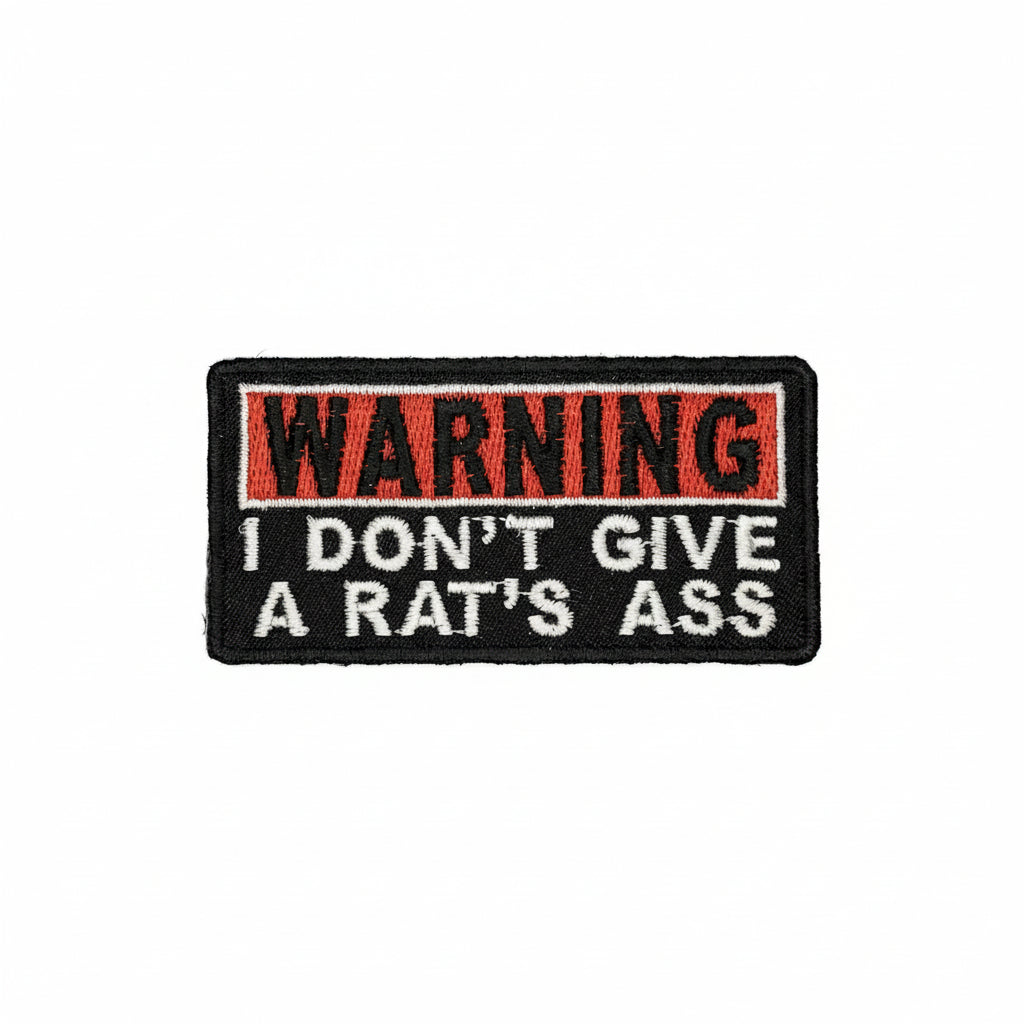 Warning I don't give a rats ass Iron On Patch. Great for attaching to your jackets, shirts, pants, jeans, hats.  Size: 7.62x3.81cm www.moralepatches.com.au
