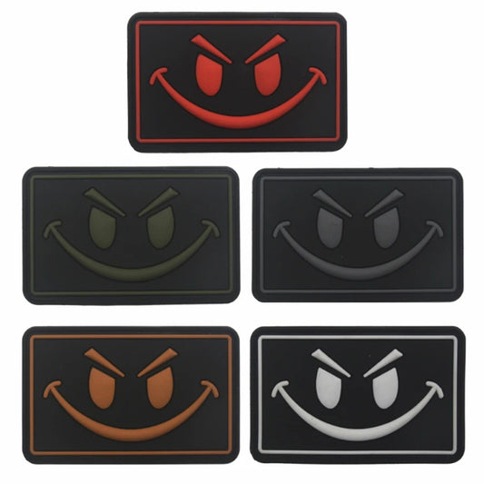 Big Evil Smiley PVC Patch Large, Velcro backed Badge. Great for attaching to your field gear, jackets, shirts, pants, jeans, hats or even create your own patch board.  Size: 8x5cm www.moralepatches.com.au