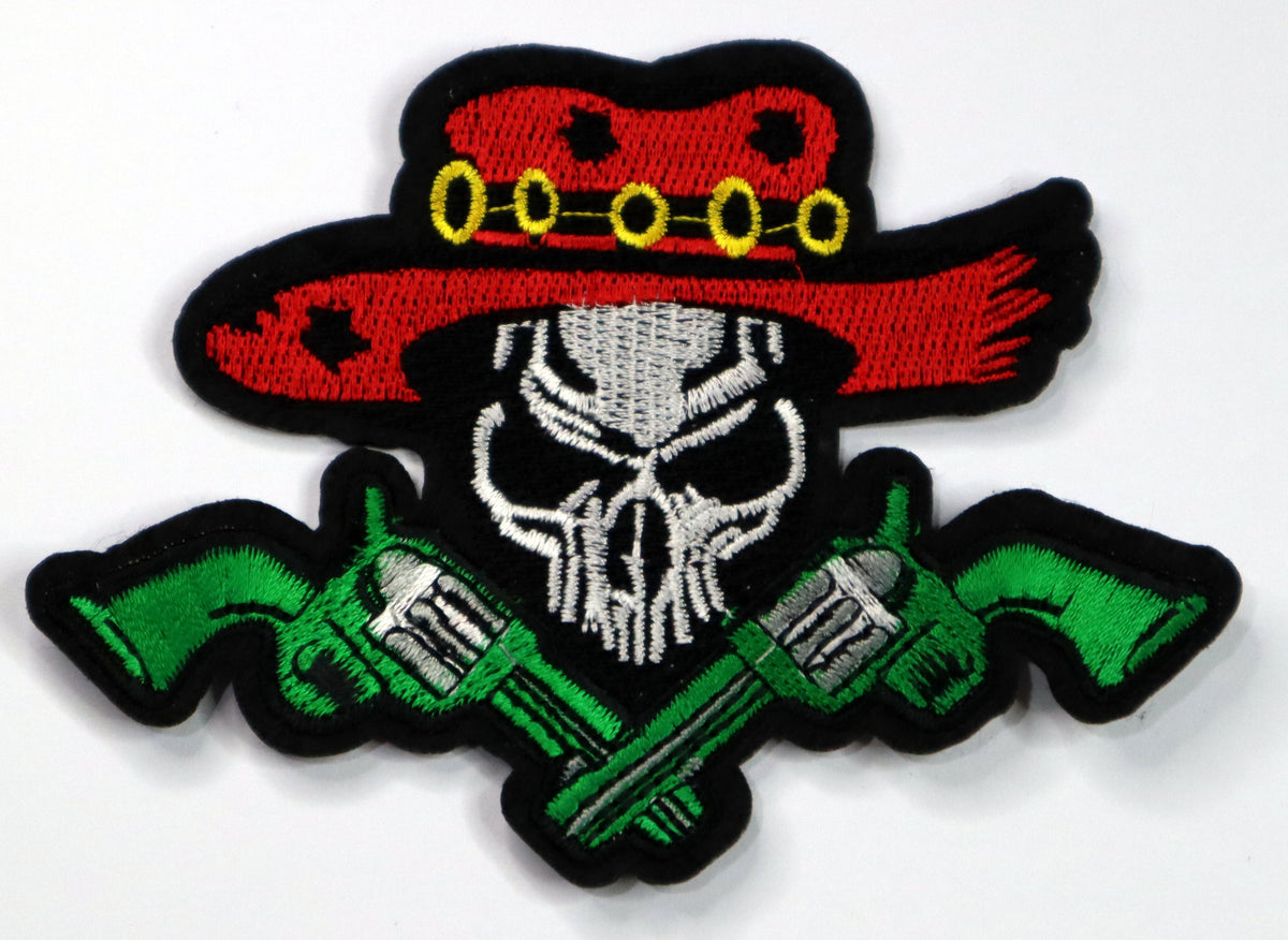 Skull with double pistols Iron On Patch. Great for attaching to your jackets, shirts, pants, jeans, hats.  Size: 11.5x8.5cm