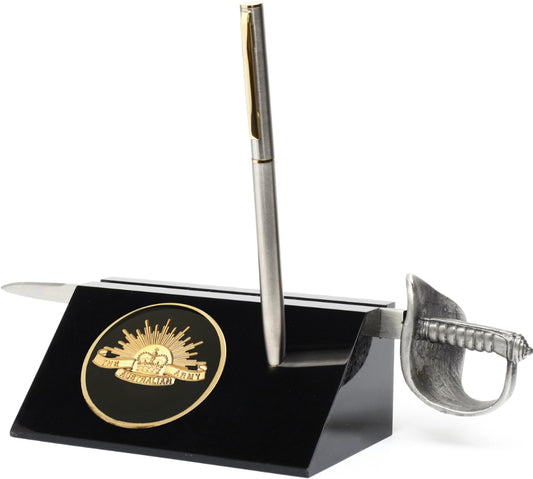 Army Medallion in a stylish acrylic desk stand with a quality pen and Army sword letter opener. Presented in a silver gift box with a clear lid, this is the perfect gift to put on the desk at work or at home.